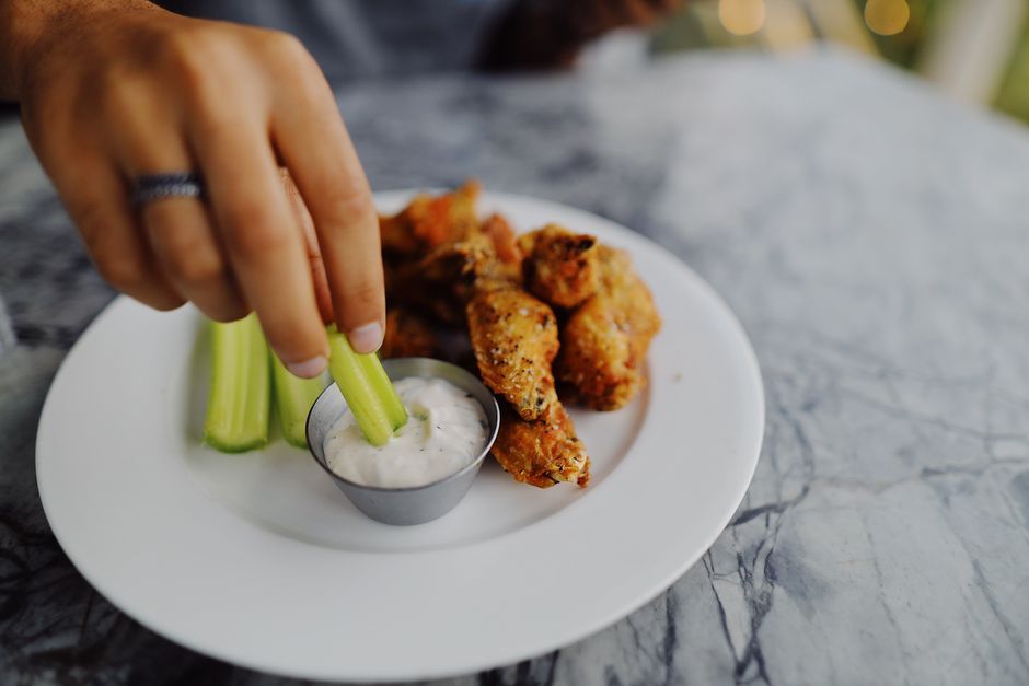 Chicken Wings — Whole wings, fried or baked, usually sauced or dry-rubbed.