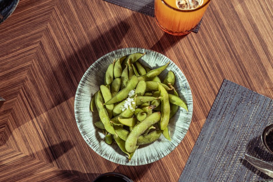 Edamame — Steamed young soybeans in the pod, salted.