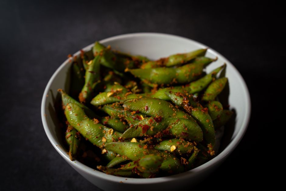 Edamame — Steamed young soybeans in the pod, salted.