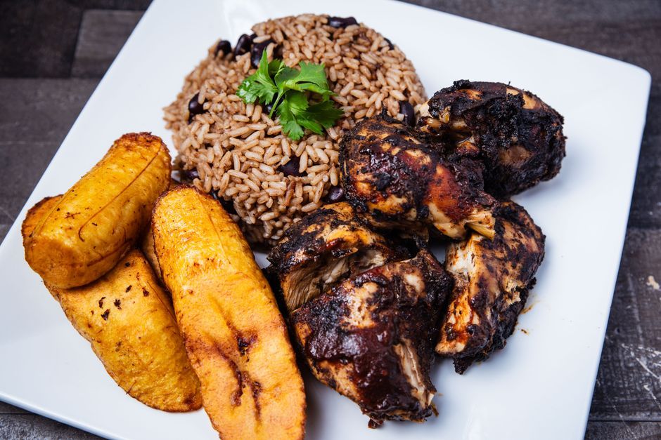 Jerk Chicken — Chicken marinated in allspice and scotch bonnet, then grilled.