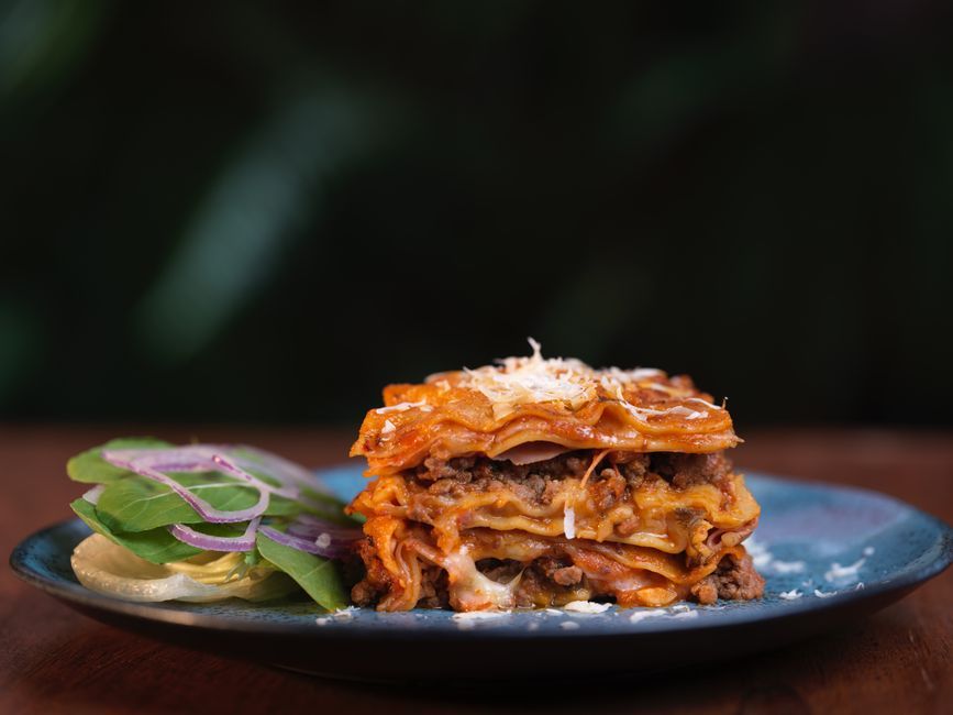 Lasagna — Layered pasta sheets with sauce, cheese and filling, baked.