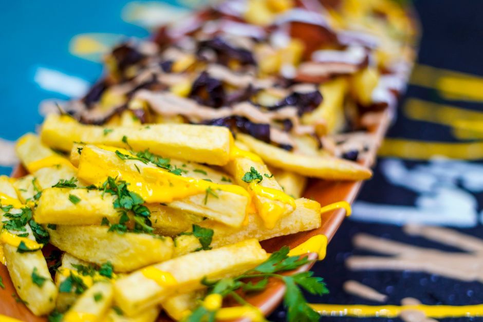 Loaded Fries — Fries under cheese, meat and sauces.