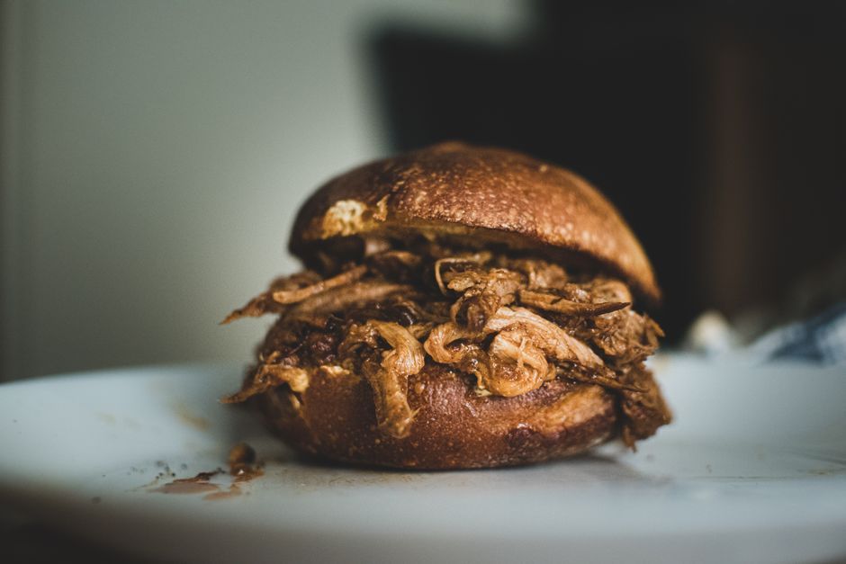 Pulled Pork — Slow-cooked pork shoulder shredded and sauced.