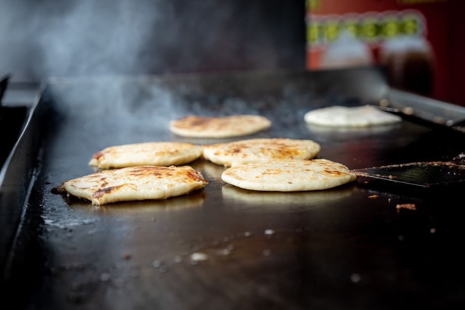 Shrimp Pupusas — Thick griddled corn cakes stuffed with cheese, beans or pork.