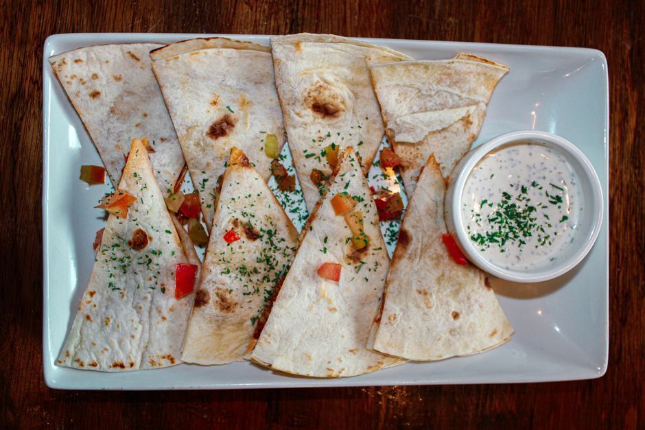 Quesadillas — Tortilla folded over melted cheese and filling, griddled.