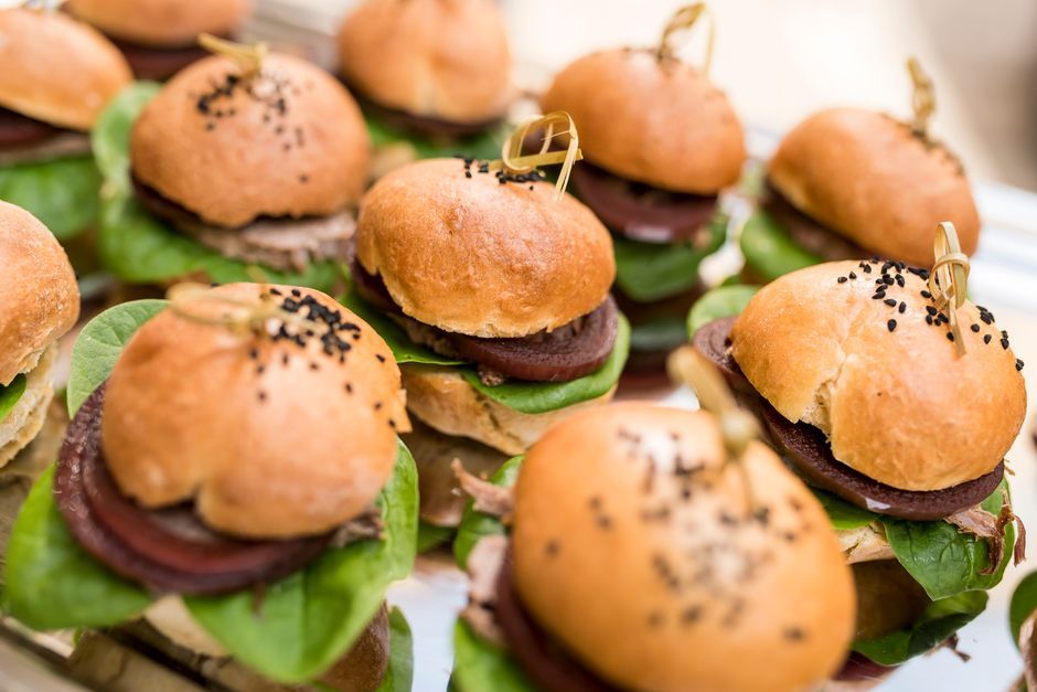 Sliders — Small burgers served two or three to a plate.