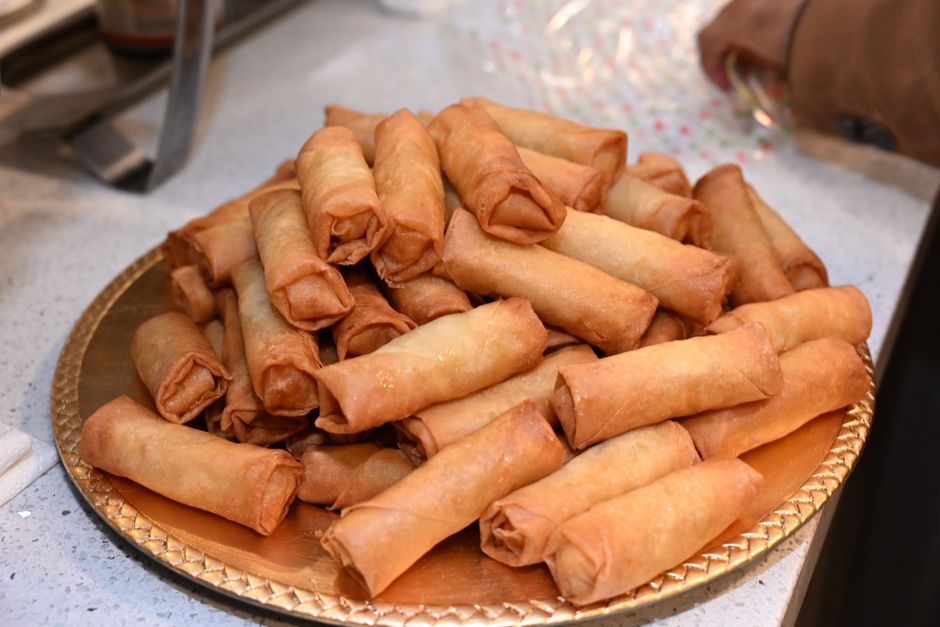 Spring Rolls — Vegetables wrapped in a thin sheet, served fried or fresh.