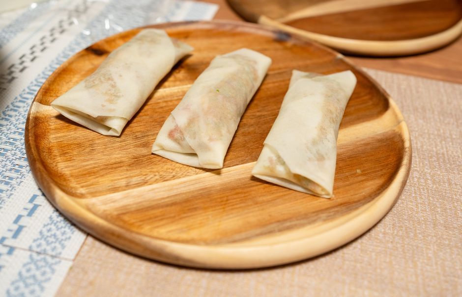 Spring Rolls — Vegetables wrapped in a thin sheet, served fried or fresh.