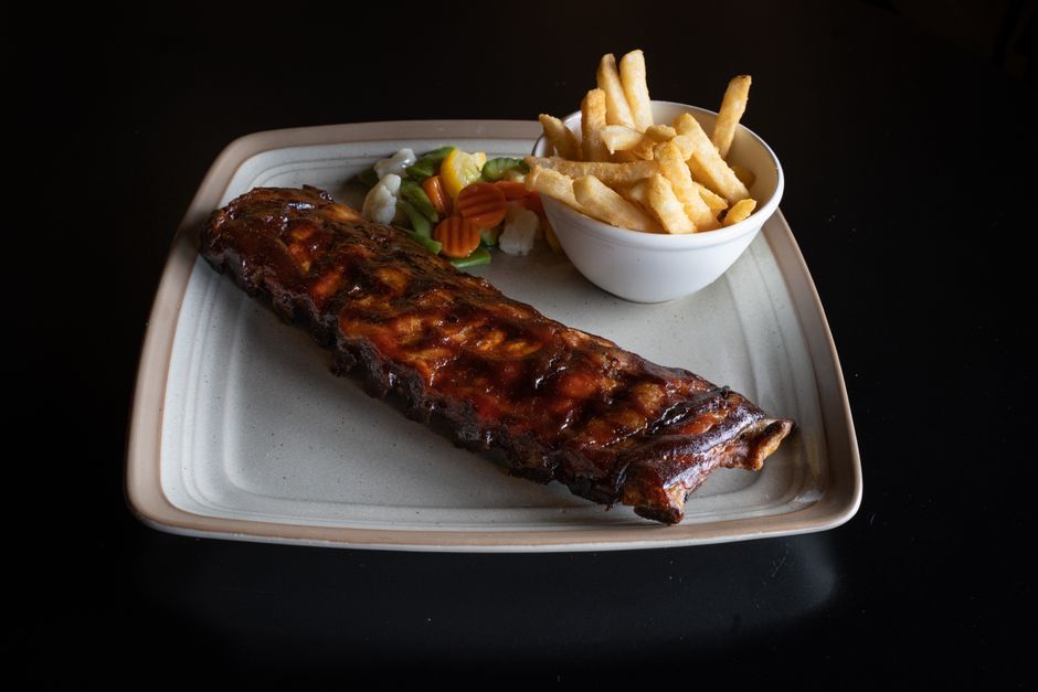 St. Louis Ribs Platter — Trimmed pork spare ribs, smoked and glazed.