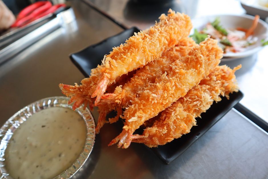 Tempura — Seafood or vegetables in a light batter, fried.