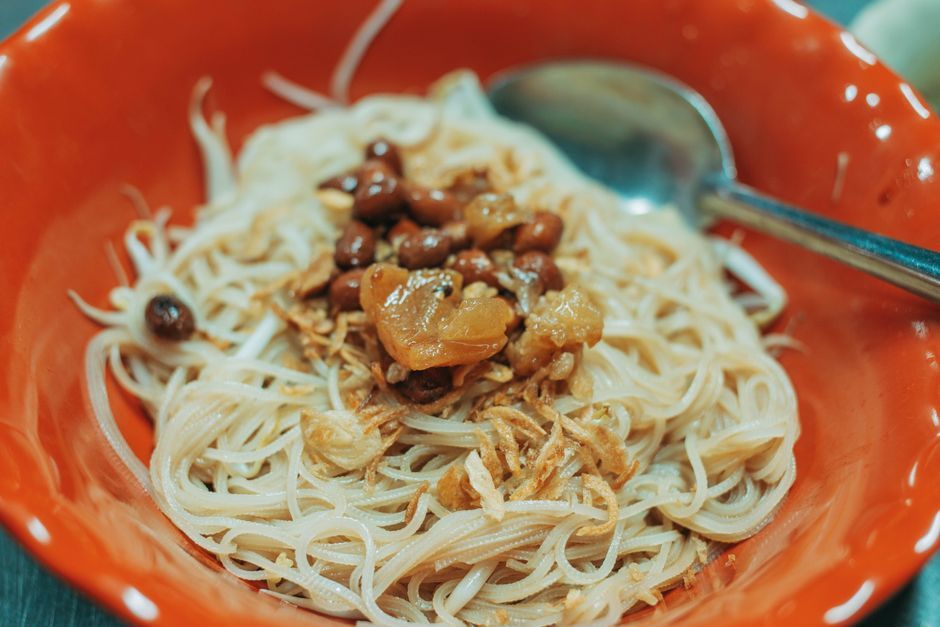 Bowls — Cold rice noodles topped with grilled meat and herbs.