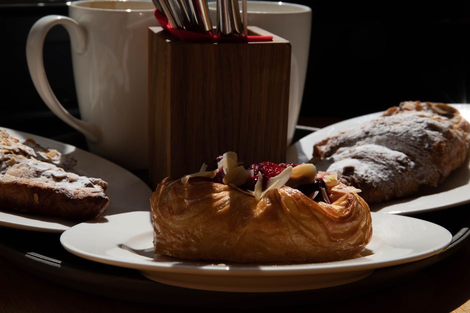 Coffee and pastries of the kind served at a neighbourhood cafe
